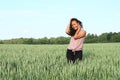 Portrait of pretty girl in field Royalty Free Stock Photo