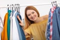 portrait pretty girl looking trough wardrobe Royalty Free Stock Photo