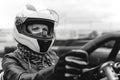 Portrait of a pretty girl wearing a white helmet close up, detail of Go-kart. karting track racing, copy space. serious look, Royalty Free Stock Photo