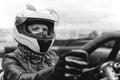 Portrait of a pretty girl wearing a white helmet close up, detail of Go-kart. karting track racing, copy space. serious look,