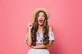 Portrait of pretty glamour woman 20s wearing straw hat screaming