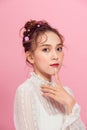 Portrait of pretty lady youth touch chin dilemmas wear fashionable outfit isolated pink background Royalty Free Stock Photo