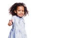 Portrait of pretty little african american girl in blue dress shows gesture, everything is fine, a class sign on white Royalty Free Stock Photo