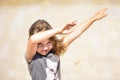 Portrait of a pretty little girl with windy hair on the beach in summer Royalty Free Stock Photo