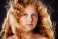 Portrait of pretty little girl with windy hair. Fashion photo Royalty Free Stock Photo