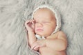 Portrait of pretty newborn. Cute baby sleeping and smiling Royalty Free Stock Photo