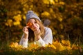 Pretty girl in autumn park