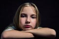 Portrait of a pretty pensive teenage girl with long hair. Pretty woman face close up Royalty Free Stock Photo