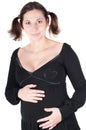 Portrait of pretty pregnant woman in black dress Royalty Free Stock Photo