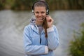Portrait of a pretty smiling customer service operator wearing a headset Royalty Free Stock Photo