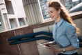 Portrait of pretty student or businesswoman in smart casual using digital tablet Royalty Free Stock Photo