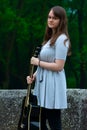 Portrait of pretty teen girl holding guitar Royalty Free Stock Photo