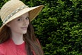 Teenage girl with straw hat Royalty Free Stock Photo