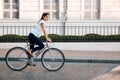 Portrait of a pretty woman on bicycle in the city Royalty Free Stock Photo