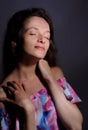 portrait of pretty woman in pink dress