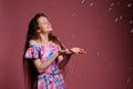 portrait of pretty woman in pink dress