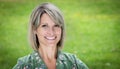 Portrait Of A Pretty Woman Smiling In The Forest. Isolated on green Royalty Free Stock Photo