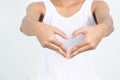 Portrait of a pretty woman in white shirt she make heart Royalty Free Stock Photo