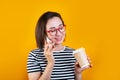 Portrait of a pretty young asian woman using mobile phone while holding takeaway coffee cup Royalty Free Stock Photo