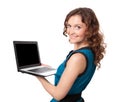 Portrait of a pretty young businesswoman holding a laptop Royalty Free Stock Photo