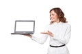 Portrait of a pretty young businesswoman holding a laptop Royalty Free Stock Photo