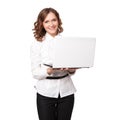 Portrait of a pretty young businesswoman holding a laptop Royalty Free Stock Photo