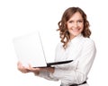 Portrait of a pretty young businesswoman holding a laptop Royalty Free Stock Photo