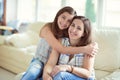 Portrait of pretty young mother with her tennager daughter Royalty Free Stock Photo