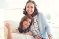 Portrait of pretty young mother with her tennager daughter Royalty Free Stock Photo