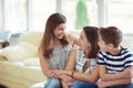 Portrait of pretty young mother with her tennager daughter and s Royalty Free Stock Photo