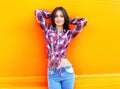 Portrait of pretty young slim woman wearing a checkered shirt Royalty Free Stock Photo