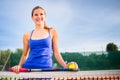 Portrait of a pretty young tennis player Royalty Free Stock Photo