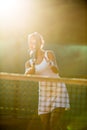 Portrait of a pretty young tennis player at play Royalty Free Stock Photo