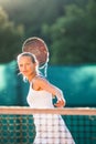 Portrait of a pretty young tennis player at play Royalty Free Stock Photo