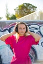 Portrait of pretty young woman in headphones