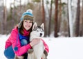 Portrait of a pretty young woman with her pet dog Royalty Free Stock Photo