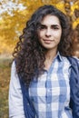 Portrait of pretty young woman with long curly hair Royalty Free Stock Photo