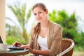 Portrait of a pretty young woman working on her computer