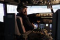 Portrait of professional aviator using cockpit dashboard command Royalty Free Stock Photo