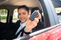 Professional Woman showing car keys. Royalty Free Stock Photo