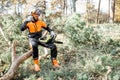 Professional lumberman resting in the forest