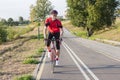 Portrait of Professional Male Cyclist Doing Uphill Royalty Free Stock Photo