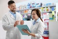 Portrait of professional pharmacists in drugstore Royalty Free Stock Photo