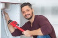 Portrait professional plumbing during repairs