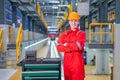 Portrait of professional technician worker stand with arm crossed and look at camera with smiling in electrical or sky train Royalty Free Stock Photo