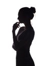 Portrait profile of beautiful girl with hand-picked hair, silhouette of a woman on a white isolated background, concept beauty and Royalty Free Stock Photo