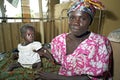 Portrait proud mother with child in Ghanaian hospital Royalty Free Stock Photo