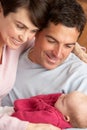 Portrait Of Proud Parents With Newborn Baby Royalty Free Stock Photo