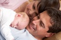 Portrait Of Proud Parents With Newborn Baby Royalty Free Stock Photo