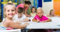 Portrait pupil girl studying in school class